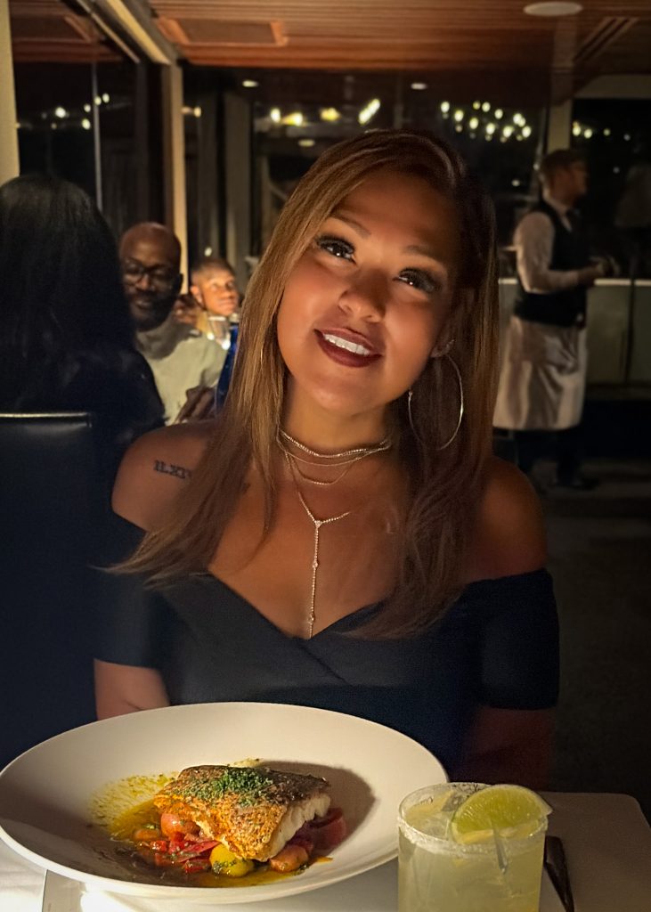 Jocilyn Hardguittini, founder of Flavor & Fuego, poses during a recent dinner outing.